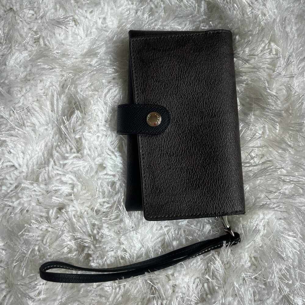 Coach brown and black wristlet with card holder on inside flap